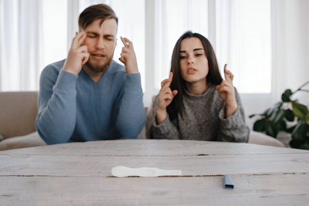 Couple anxiously waiting for pregnancy test result